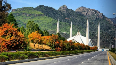 beautiful minarets on a modern mosque - street, trees, minarets, mountains, mosque