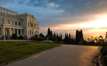 russian livadia palace in crimea ukraine - driveway, sunrise, sea, treesmview, palace