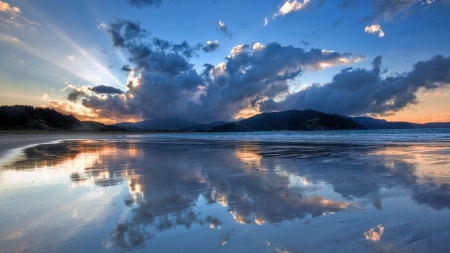 sunbeams over a bay in new zealand - reflection, clouds, sunbeams, beach, bay