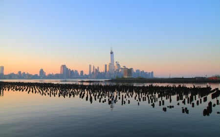 view of nyc from new jersey at sunset - view, skyscrapers, city, bay, sunset, pillars