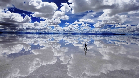 spectacular reflections on salt flat in bolivia - clouds, lake, salt, man, reflection, sky