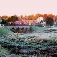 Sunrise. Old stones bridge. Kandava.