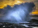 Wave Crashing at Sunset