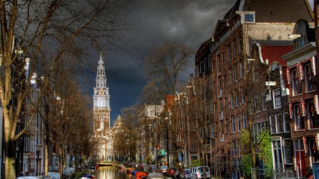 church at the end of an amsterdam street - street, boats, trees, church, clouds, city, canal, storm