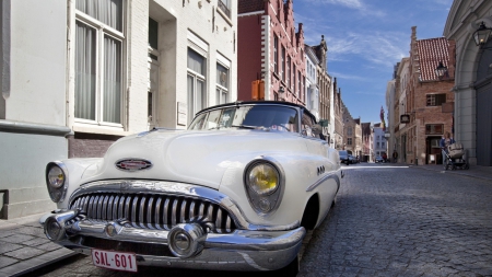 vintage car on a european street - street, car, vintage, city, convertable