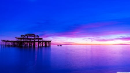 Sunset over rust - nature, sky, ocean, rust, clouds, sun, sunset, sea