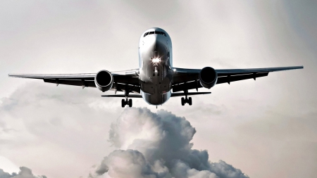 passenger plane coming in for a landing hdr - plane, clouds, landing, hdr, wheels