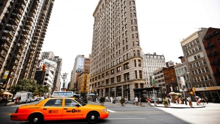 the flatiron building in manhattan - city, taxi, streets, skyscrapers