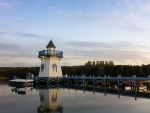 lovely lake lighthouse at end of a pier