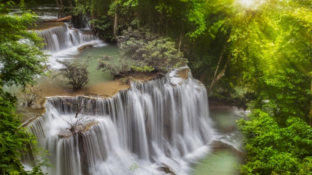 marvelous cascading waterfalls in thailand - sunbeams, rays, roaks, sunshine, cascades, sunlight, trees, cascade, water, waterfall, glow, view, fall, forest, beautiful