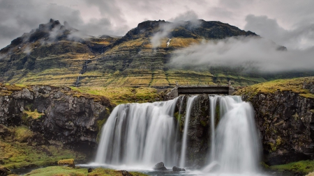 waterfall at magical kirkjufell mountain iceland - waterfall, bridge, mountain, clouds