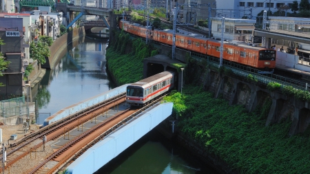 trains in a japanese city - canal, city, tracks, trains