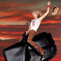 Madonna riding a Mechanical Bull