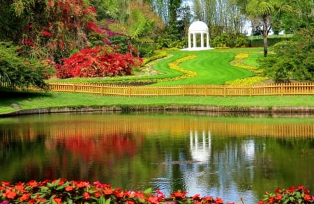 Spring reflections - slope, trees, greenery, colorful, gazebo, spring, reflections, pretty, river, grass, garden, pond, lake, park, lovely, nature, beautiful, flowers