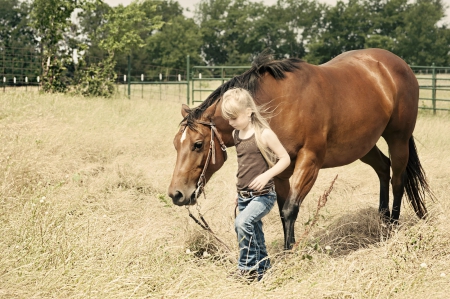 YOUNG COWGIRL LEADING HORSE - HORSE, COWGIRL, TREES, LEADING