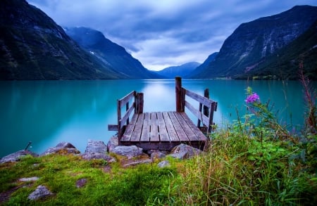 Wooden dock at norwegian lake - hills, blue, tranquil, grass, reflection, mountain, shore, mist, waters, lake, sky, clouds, Norway, beautiful, mirrored, lovely, dock, wildflowers, wooden, clear