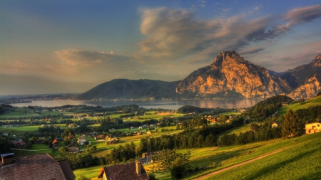 lovely austrian lakeside village - lake, clouds, village, mountain, hillside