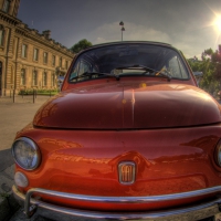 fiat 500 parked next to a paris museum hdr