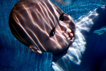 Creepy Baby Doll - doll, creepy, baby, swimming, eerie, pool