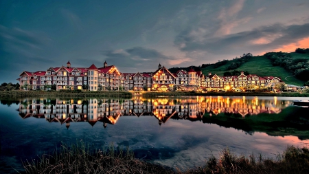 lakeside townhouses at dusk - shore, lights, lake, dusk, houses, reflection