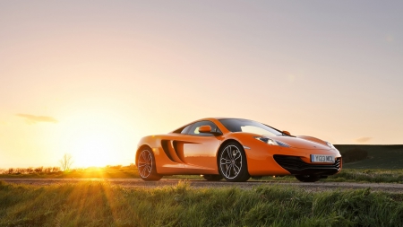 sunrise over an orange mclaren mp4 12c - bright, car, orange, sunrise, grass