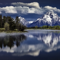 mount moran above snake river in the grand tetons