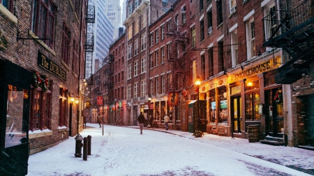 stone street in downtown manhatten in winter - stores, street, winter, city, dusk, lights