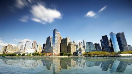 skyscrapers reflected in new york city harbor - clouds, reflections, skyscrapers, city, harbor