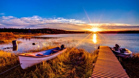 boats docked on a lake at sunrise - lake, boats, dock, sunrise, grass