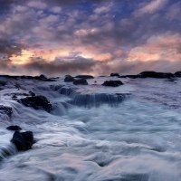 amazing waves over rocky seashore hdr