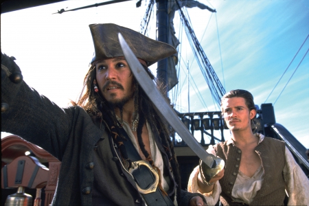 Pirates of the Caribbean: The Curse of the Black Pearl (2003) - hat, actor, Captain Sparrow, jack, ship, sword, Johnny Depp, man, Orlando Bloom, movie, The Curse of the Black Pearl, Pirates of the Caribbean