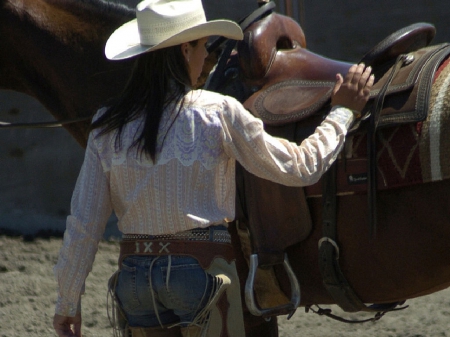 Saddle Up - women, fun, female, hats, saddles, brunettes, girls, cowgirls, style, outdoors, horses, westerns