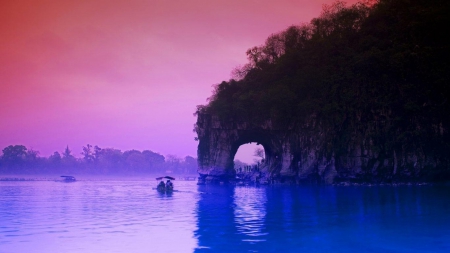 arched cliff on a river in china at dusk - arch, purple, cliff, river, dusk, boat