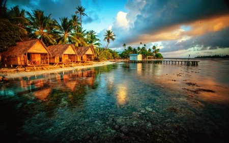 Tropical rest - relax, lagoon, amazing, beach, reflection, exotic, paradise, houses, sky, palms, beautiful, vacation, sea, ocean, pier, tropics, colorful, sunset, huts, dusk