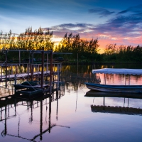 Boat moored at sunset