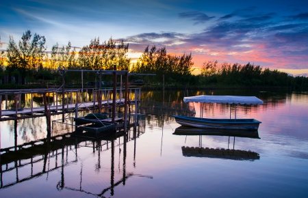 Boat moored at sunset