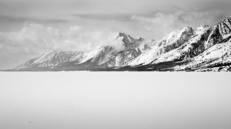 prairie to a mountain range in wyoming in winter - black and white, mountains, winter, prairie