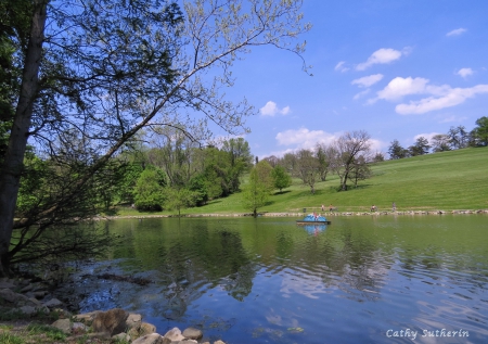 Reflections of Spring on the Lake - lake, water, spring, nature, paddleboat, reflection, clouds, blue, skies, boat