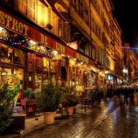 restaurant on a side street in lyon at night hdr