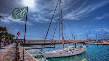 sailboat in a beautiful harbor marina hdr - sailboats, sun, marina, harbor, hdr, docks, flags