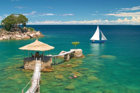 Malawi Lake - clouds, summer, Africa, beach, beautiful, diving, vacations, resort, crystal water, tree, sailboat, lake, hut, rocks