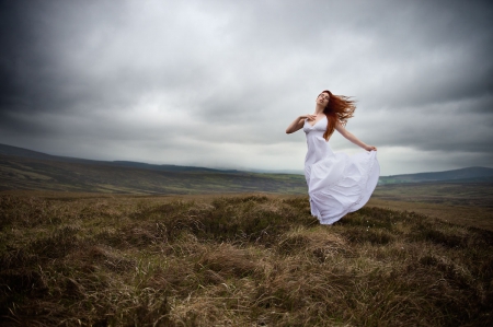 Before the Storm - women, clouds, white dress, wind, grass, field, sky