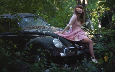 A woman on the hood of a volkswagen. - forests, people, cars, nature, other