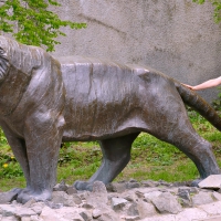 Monika Posing on a Statue