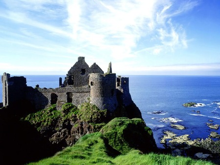 Dunluce Castle - ocean, mountain, ireland, cliff, castle ruins, clouds