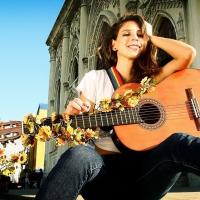 brunette with a guitar