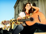 brunette with a guitar