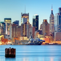 view of manhattan hudson river piers at dusk