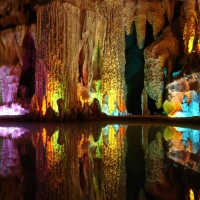 colored lights reflected inside a beautiful cave