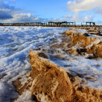 broken down pier in winter